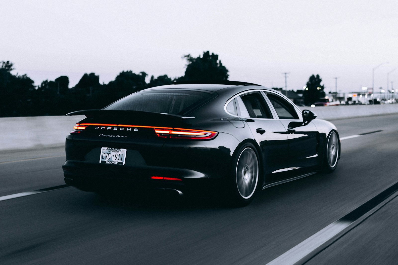Black sports car under soft studio light